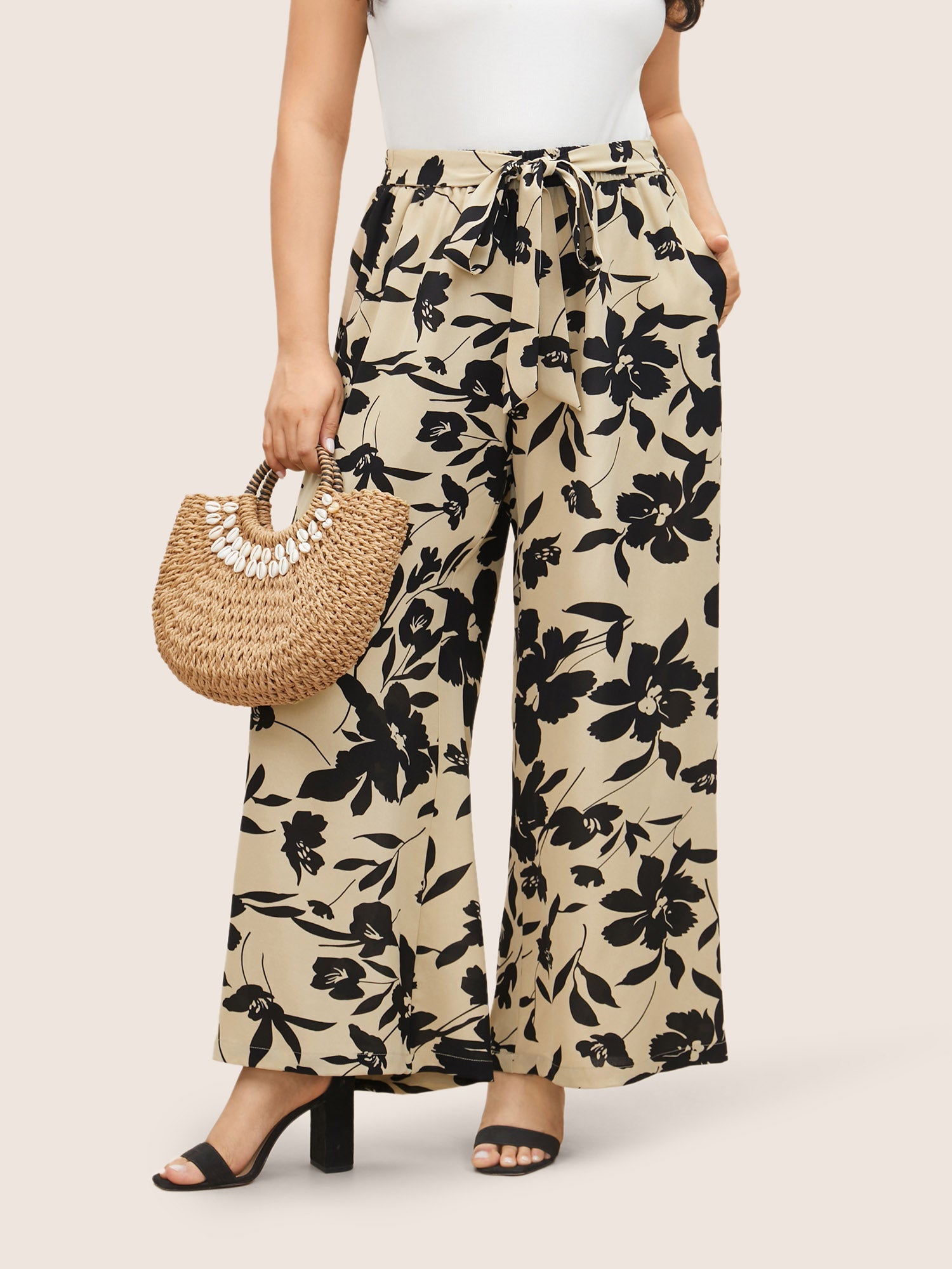 Silhouette broek met bloemenprint en stropdassen in zijnaden