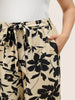 Silhouette broek met bloemenprint en stropdassen in zijnaden