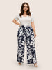 Silhouette broek met bloemenprint en stropdassen in zijnaden