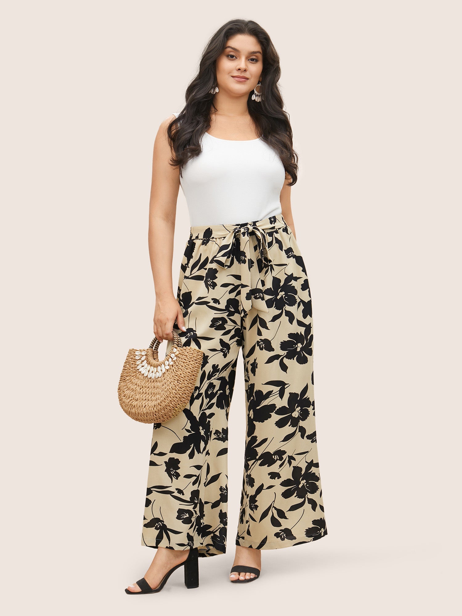Silhouette broek met bloemenprint en stropdassen in zijnaden