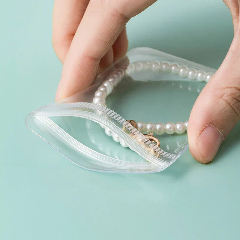 JewelryStorage: Transparant Juwelen Opbergboek Set